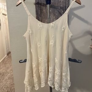 Cream colored, Lacey, loose and flowing top
